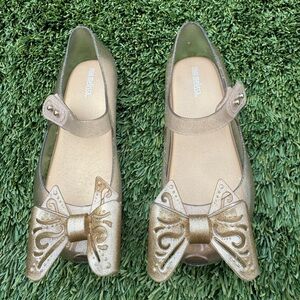 Mini Melissa Shimmering Gold Dress Shoes with Bow